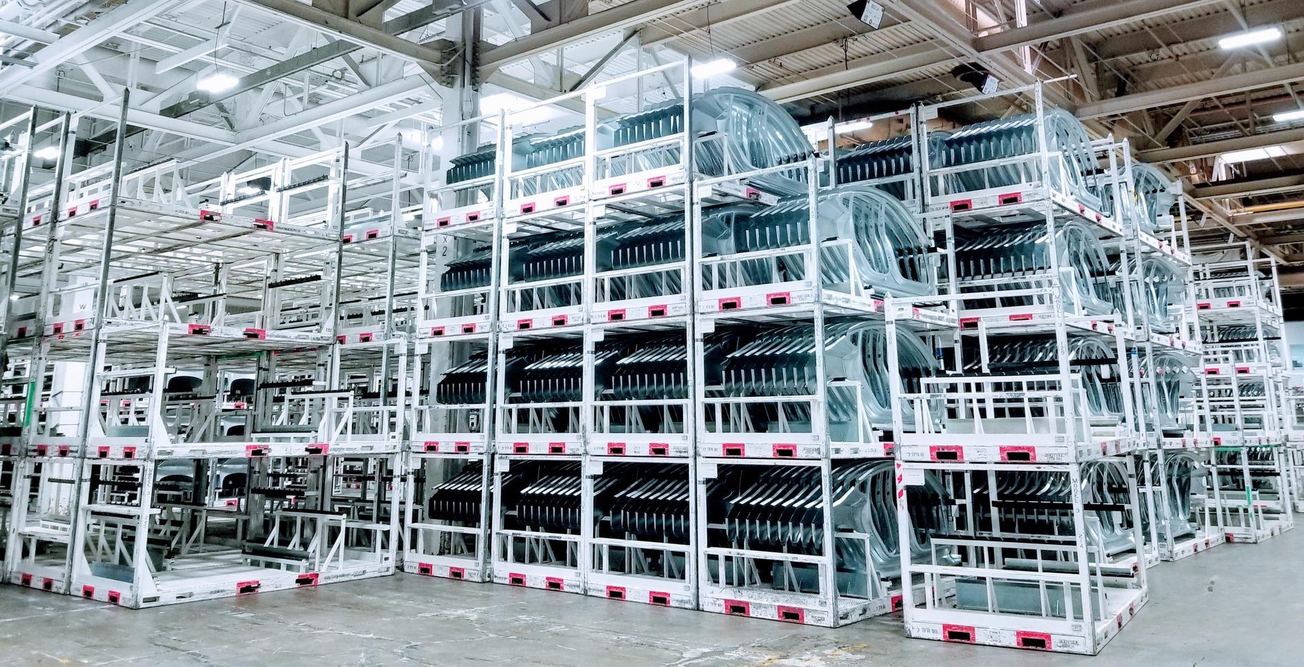 Cybercab Robotaxi Elon Musk: “Tesla’s Long-Term Competitive Advantage Will Be Manufacturing” tesla-fremont-factory-body-parts-press-storage