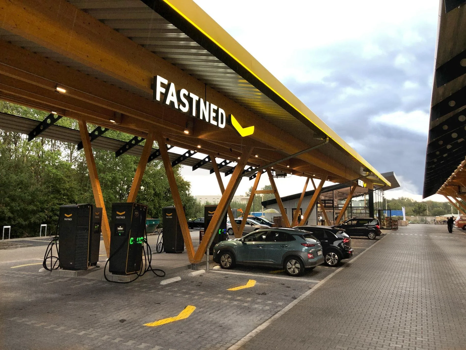Cybercab Robotaxi Tesla & Fastned Join Forces To Build Germany’s Largest Fast Charging Station ation-kreuz-hilden-germany-039s-largestcharginghu