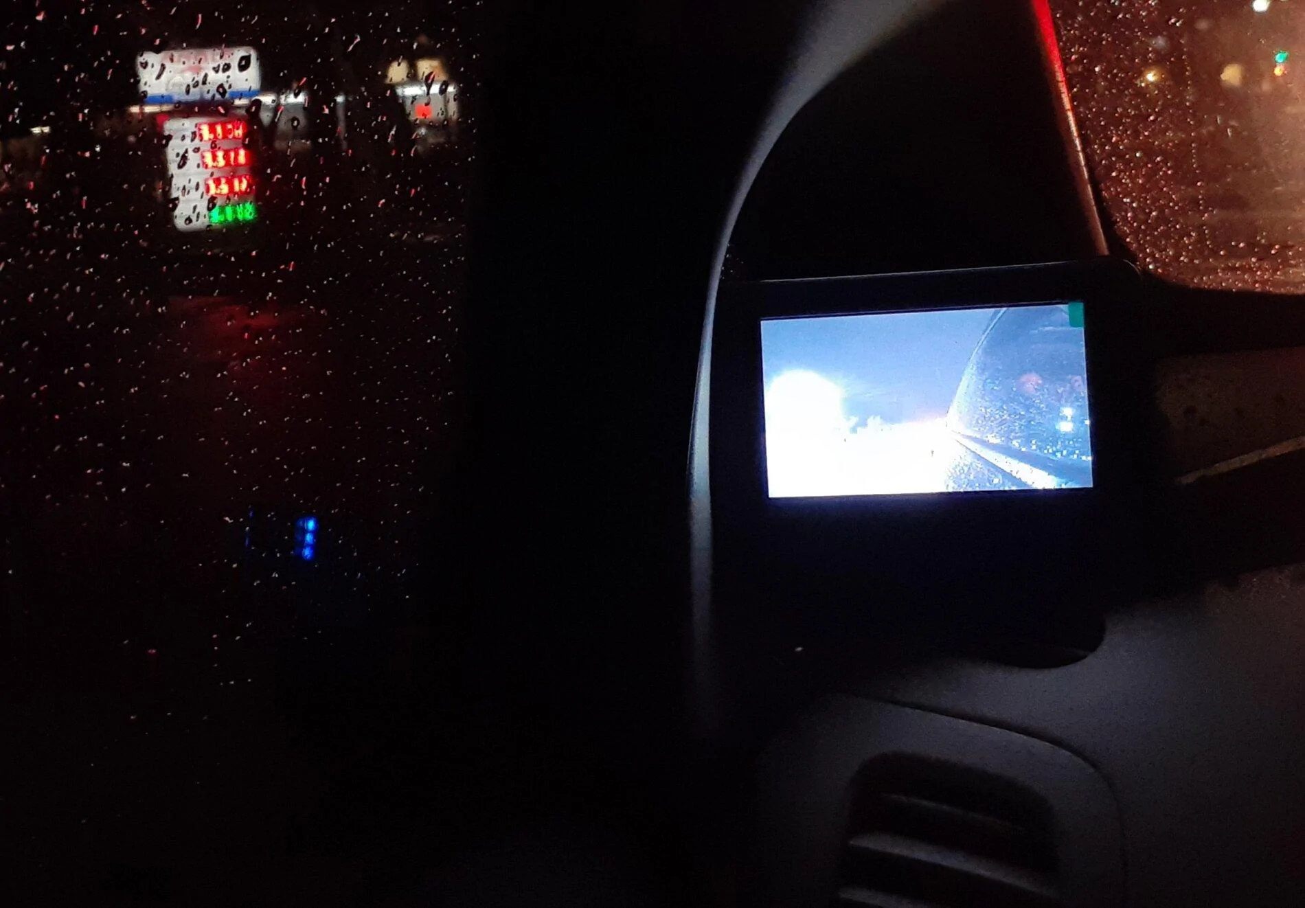 Cybercab Robotaxi camera side mirror on leaf 20210126_183833