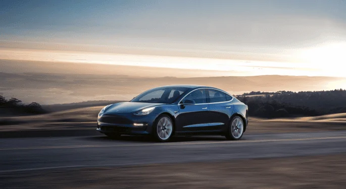 Cybercab Robotaxi Tesla Model 3 Surpasses VW ID.3 In Germany, Becomes Country's No. 2 EV Bestseller In February model_3_-_blue_driving_8