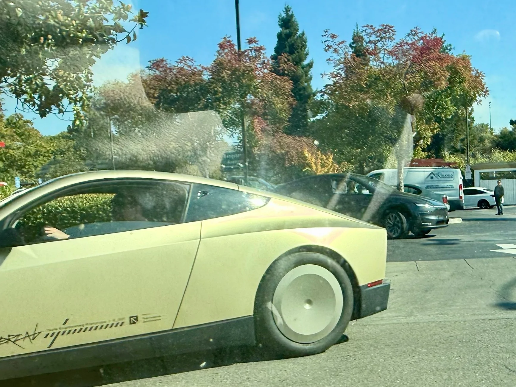 Cybercab Robotaxi Cybercab gets frameless windows and longer doors Cybercab longer doors 2