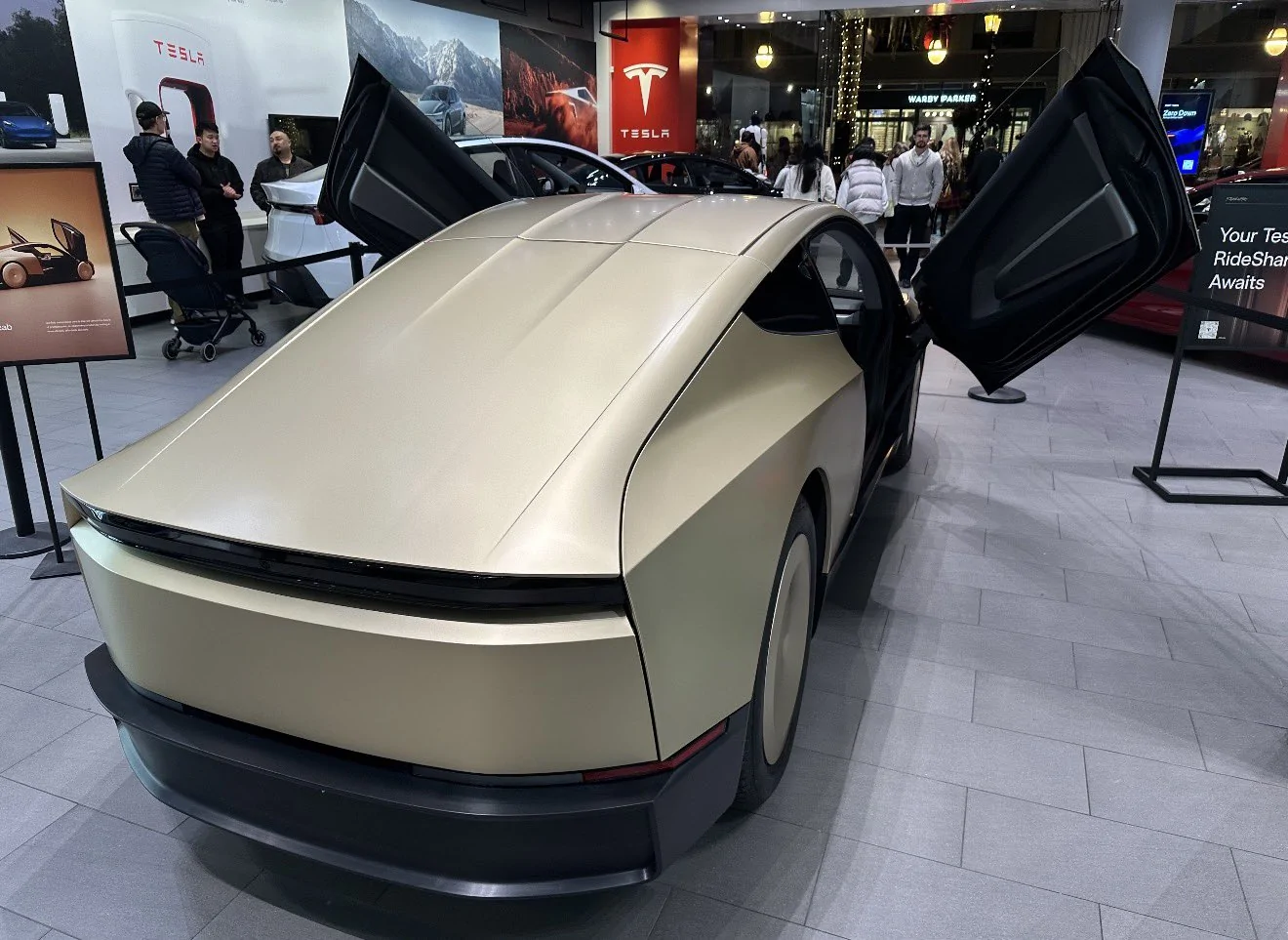 Cybercab Robotaxi Cybercab in more production-ready design on display at Tesla Santana Row in San Jose G8I6pyjWwAsx9fi