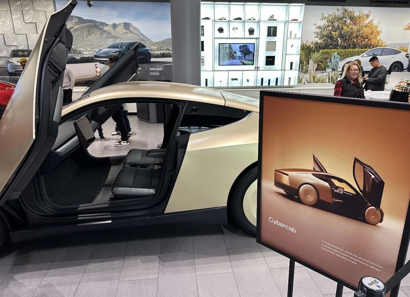 Cybercab Robotaxi Cybercab in more production-ready design on display at Tesla Santana Row in San Jose G8I6qMlXgAA5FVR