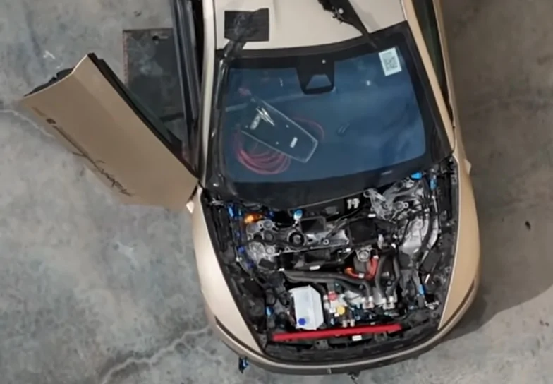 Cybercab Robotaxi Cybercab Showing Frunk Motor Bay - GigaTexas Factory - Joe Tegtmeyer 2026 03 30 - Cybercab Frunk Motor Exposed 2 