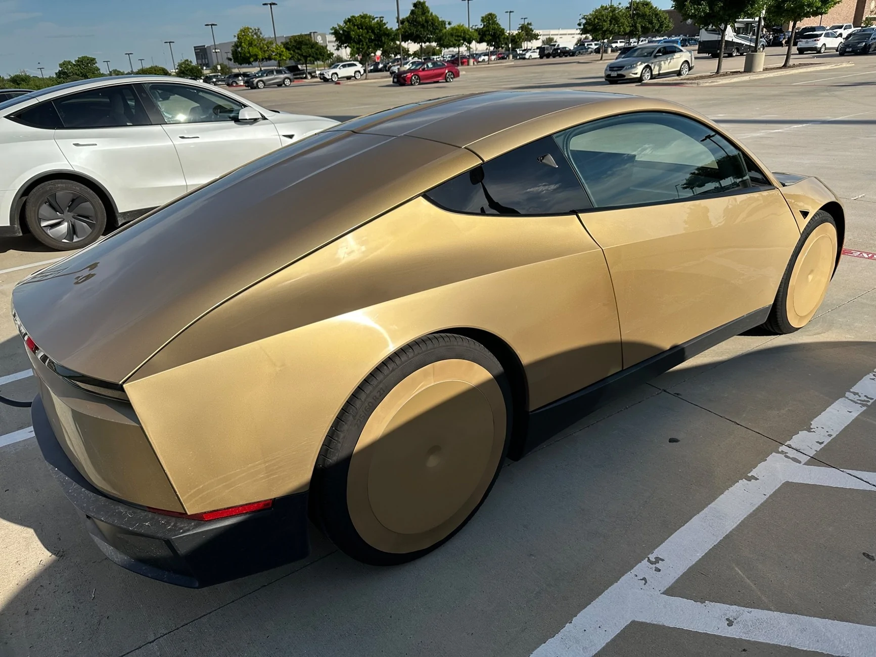 Cybercab Robotaxi Cybercab looks great in gloss gold gloss gold cybercab 2