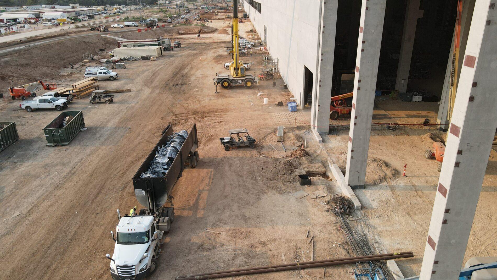 Cybercab Robotaxi Tesla Model Y body castings begin to stack up at Giga Texas tesla-model-y-casting-scaled