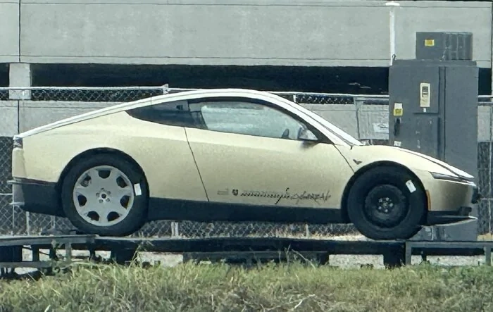 Cybercab with steering wheel & side mirrors! First sighting at Giga Texas
